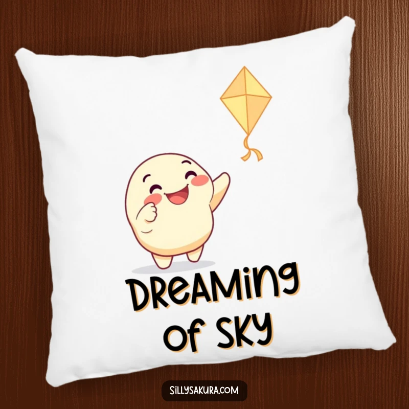 Funny pillow with a grinning character enthusiastically pointing at a dancing paper kite, bringing soft comfort and a touch of playful humor to any space.