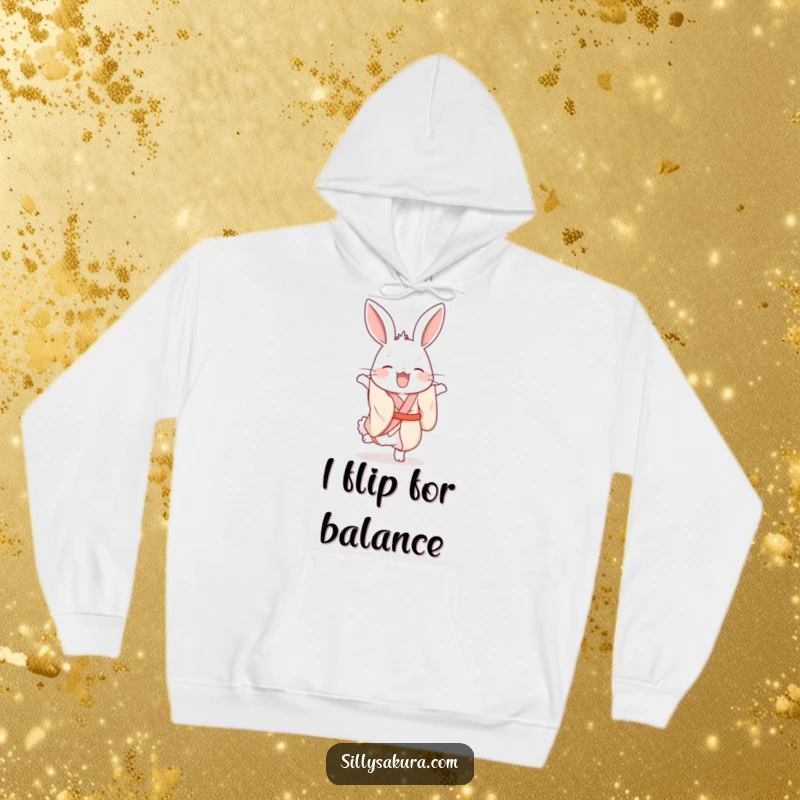Cozy funny hoodie featuring a giggling rabbit in a silk kimono, hilariously trying to balance in a handstand.
