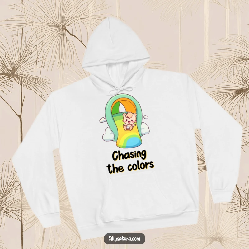 Funny rainbow slider hoodie, a happy figure energetically sliding down a bright rainbow, offering warmth and a sense of playful freedom.