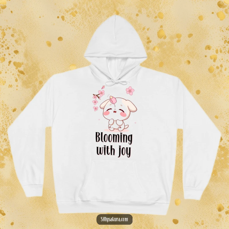 Funny hoodie: a delighted character comically balances a falling sakura petal on its nose, blending comfort and humor.