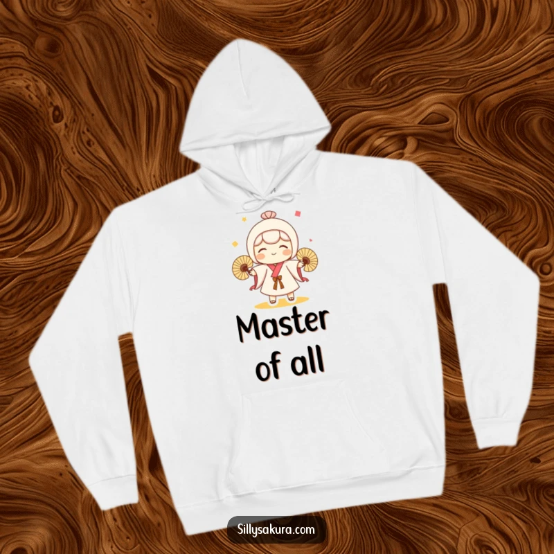 Funny hoodie featuring a cute Kokeshi doll character in the act of playfully juggling three small fans, radiating fun.