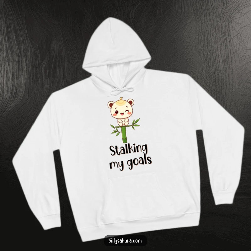 Funny hoodie designed with a cheerful character perfectly balanced on a single bamboo stalk, offering warmth and humor.