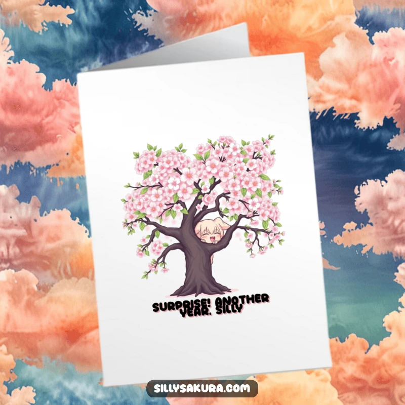 Funny free printable birthday card with a mischievous character peeking playfully from behind a large, blooming cherry blossom tree.