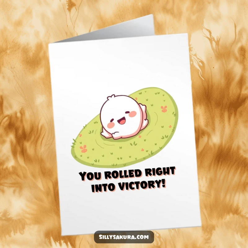 Funny Free Printable Congrats Card with a giggling character smiling and rolling down a grassy hill, celebrating an accomplishment.