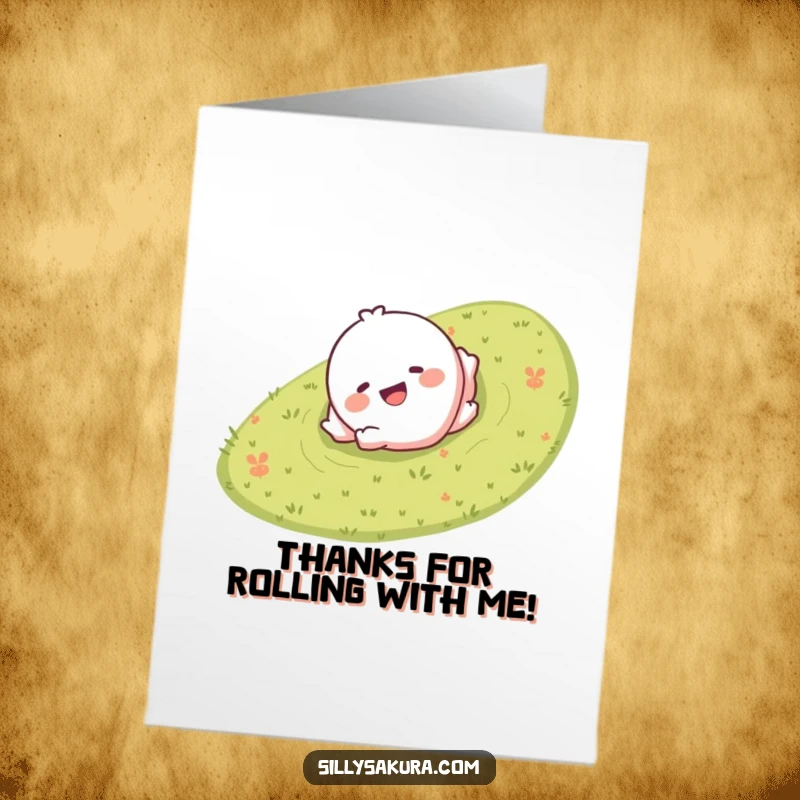 Funny Free Printable Thank You Card featuring a giggling character with a smile playfully rolling down a grassy hill, saying thank you.