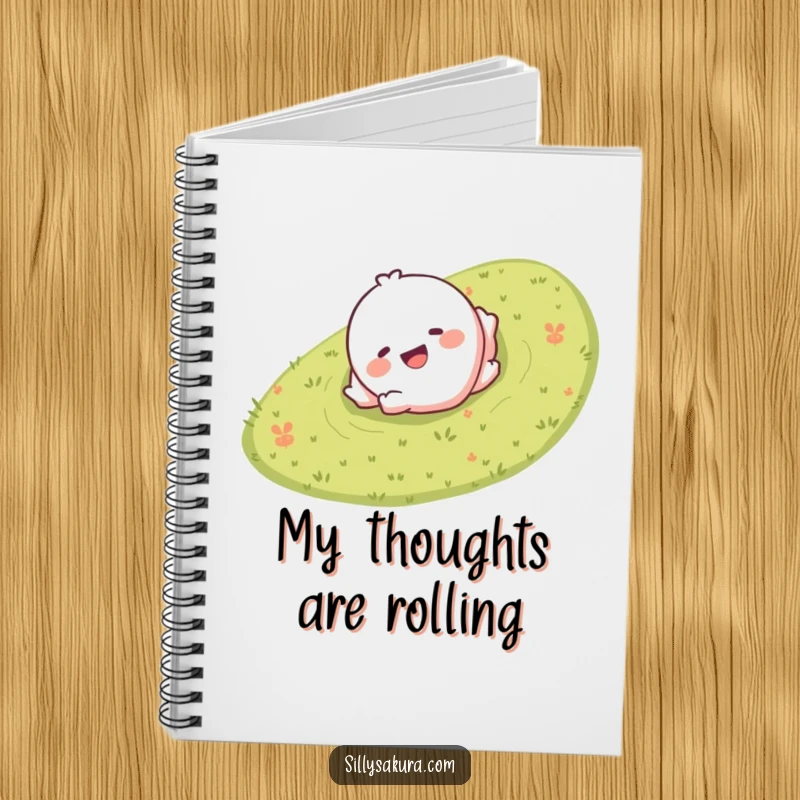 Funny notebook with a giggling character smiling and rolling down a grassy hill, ideal for capturing joyful thoughts.