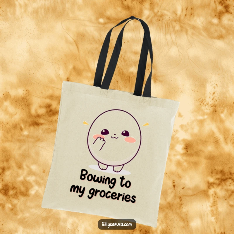Funny Kawaii Tote Bag. A small, round cute character enthusiastically mimics a bowing gesture, perfect for carrying essentials.