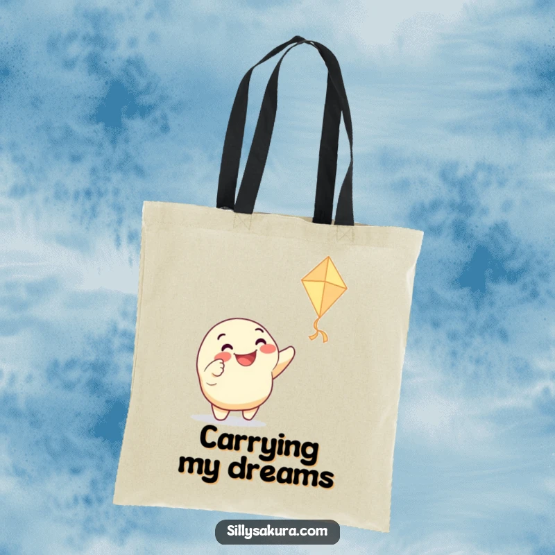 Funny tote bag featuring a grinning character enthusiastically pointing at a dancing paper kite, ideal for carrying essentials with a touch of playful humor.