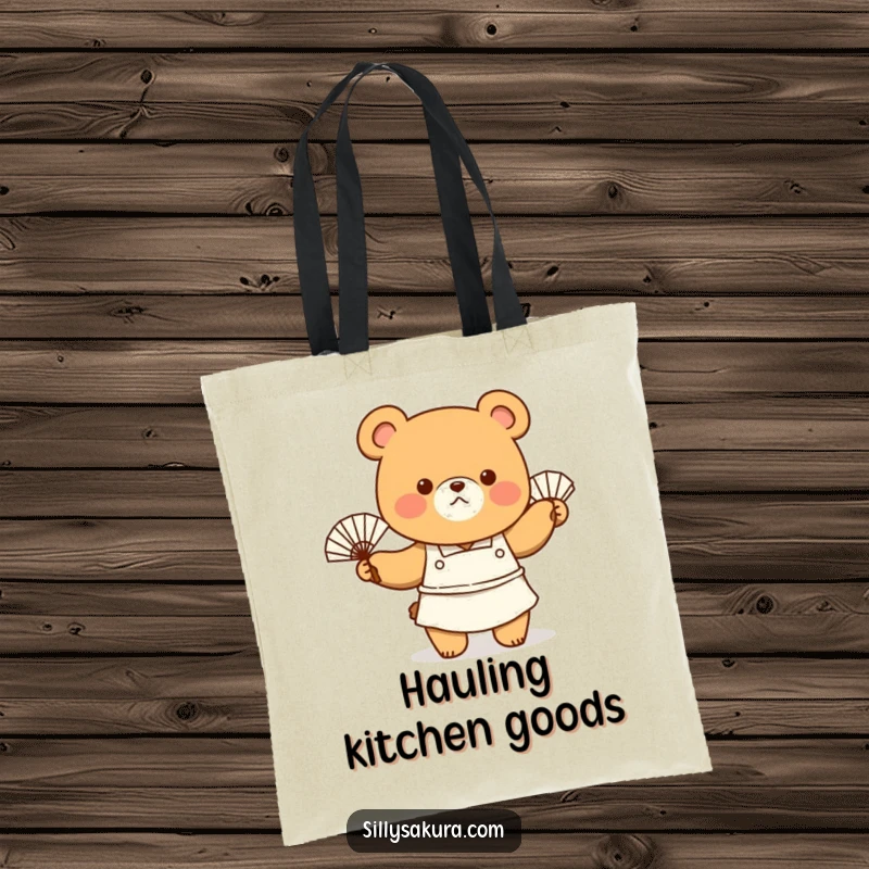 Funny Tote Bag featuring a bear chef in an apron, enthusiastically waving a fan, perfect for carrying kitchen creations.